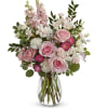 Celebrate Mom's love and grace with our elegant Mother's Day arrangement featuring