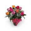 A vibrant ring of mixed-color Ecuadorian roses-pink, orange, yellow and lavender-creates an