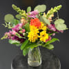 A cheerful burst of color greets the recipient with this bright mixed