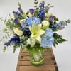 Celebrating the birth of your baby boy with blue Delphinium, purple Lisianthus