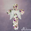 Standing floral angel cross in pink, white, and purple flowers on an easel stand