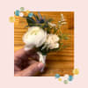 Complete your look with a handcrafted boutonni&egrave;re designed to compliment your bouquet