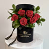 Elegant and timeless, this arrangement showcases velvety red roses surrounded by lush