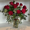 Dozen roses, any color with greens and filler