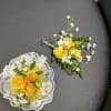 A loose, garden-style pairing with white and yellow blooms and airy greenery.