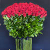 Large bouquet of red roses with a black ribbon wrap