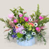 This large ceramic vase arrangement brings all the beauty of the garden