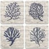 Set of four square coasters with navy coral designs on a whitewashed background