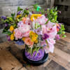 A lush, garden-style bouquet that pours joy in every direction-perfect as a
