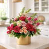 Shades of Pink Flower Arrangement in Gold Vase

Show someone special how much