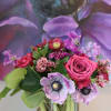 Hyacynth, sweet pea ,anemone, scabiosa and roses in shades of purple in