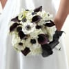 Chic, modern, and oh, so, sophisticated, this bridal bouquet is a simply