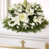 Elegant, fresh, and full of peaceful beauty, this all-white arrangement features stunning