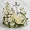 An elegant display of faith and divine peace, this beautiful arrangement will
