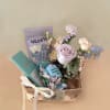 Such a pretty basket in the colors of lavender and light turquoise
