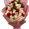 Lush, tightly packed roses in red, blush pink, cream and pale yellow