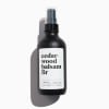 Black cedarwood balsam fir room spray bottle with white label