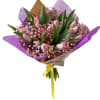 Pink tulips and baby's breath wrapped bouquet. No Vase