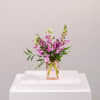 Pink snapdragon bouquet in a clear glass vase