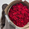 One hundred exquisite roses, hand-selected and wrapped with intention. A lavish expression