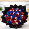 Premium arrangement of roses in stunning red and blue tones, carefully designed