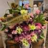 Fish-shaped floral arrangement with pink and green flowers