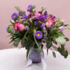 Variety of purple flowers with different shades of lavender. Flowers may vary!