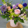 A lush, garden-style flower arrangement that feels like a bright spring morning-perfect