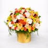 Mixed bouquet of roses and white orchids in a gold box