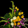 Bright yellow roses swirl with deep purple orchids and pink calla lilies