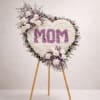 Heart-shaped floral easel tribute with 