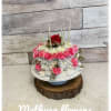 White cushions and pink minks, pink rose with candles