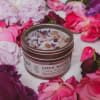 This dreamy soy candle is is packed with beautiful crushed rose petals