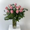 This arrangement is one dozen of our premium long stem pink roses