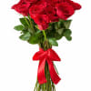 Hand-tied bouquet of red roses with a red satin ribbon bow