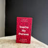 Red gift box labeled 