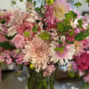 Pink and blush mixed bouquet in a glass vase