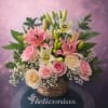 Pink and white lilies take center stage in this Pink Serenity Lily