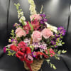 Fresh flowers in basket 