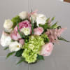 Sophisticated combination of roses, hydrangea,, and garden lisianthus. A Breath of Spring.