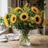 A cluster of big, golden sunflowers is the first thing they'll notice-this