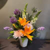 A flirty, contemporary bouquet in bright spring colors!

Measures approx. 20"Tx18"W and arrives