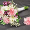 Prom Bundle! This mini prom-bouquet features pink carnations, purple alstromeria and babies