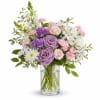 Lavender and pink bouquet in a clear glass vase