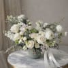 Elegant and enchanting, Whimsical Whites is a dreamy arrangement of delicate white