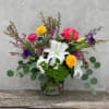 The season's most beautiful blooms designed in a garden style in a