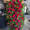 Make a bold and heartfelt tribute with our All-Red Standing Spray, featuring