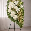 The Serenity Garden Standing Easel Spray is an elegant silk funeral arrangement