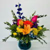 Brighten any occasion with our Happy Blooms arrangement&mdash;a joyful mix of vibrant