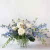 This airy, garden-style arrangement captures the serene beauty of a wild meadow